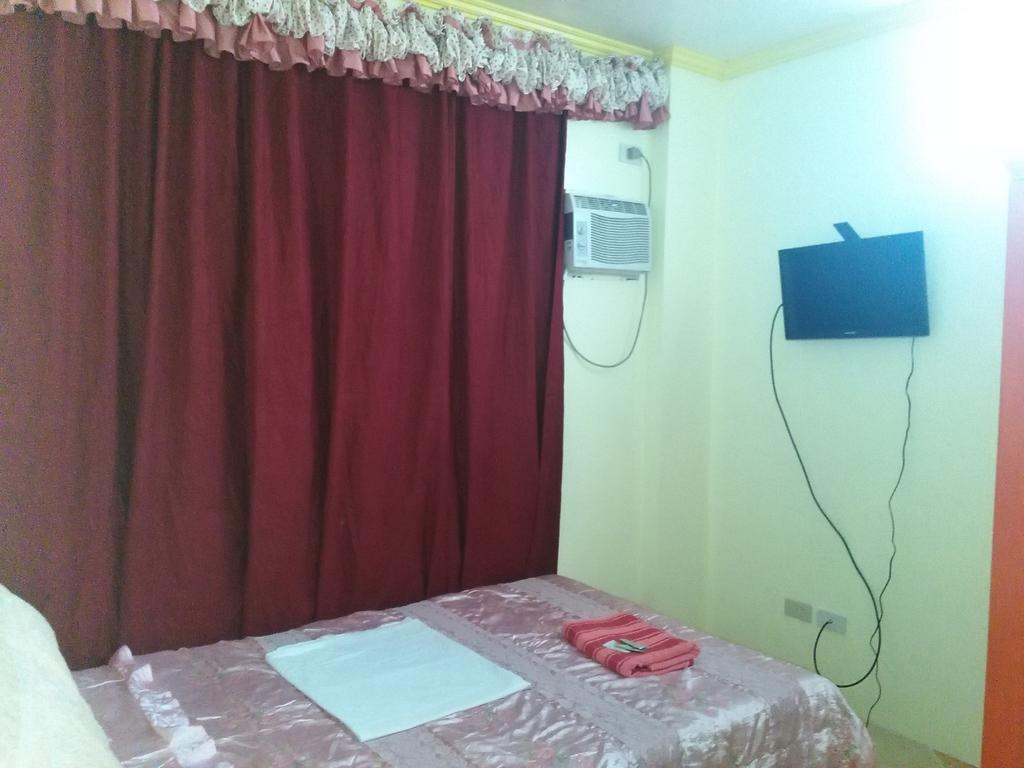 Aranas-Carillo Travellers Inn Kalibo Pokoj fotografie